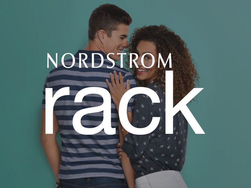 Decorative image of a man and woman smiling with a Nordstrom Rack logo overlaid on top of the image.